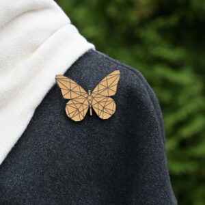 Hohtava kultainen rintakoru ”Liblikas”